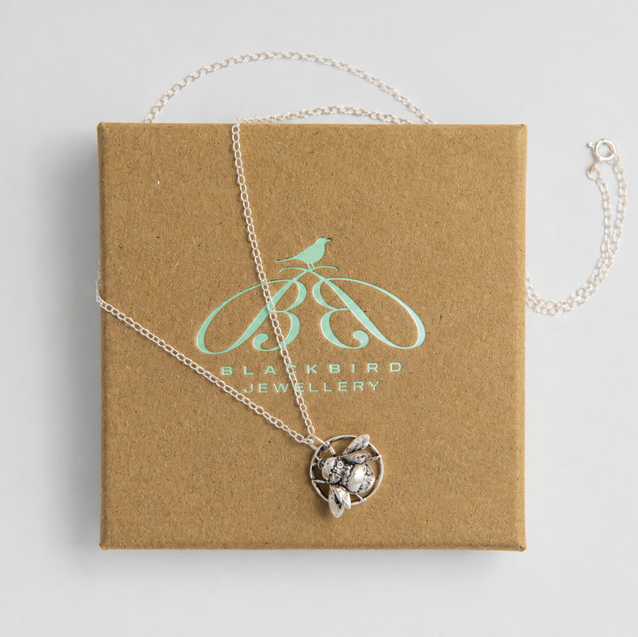 Sterling Silver bee necklace on a Blackbird Jewellery box.