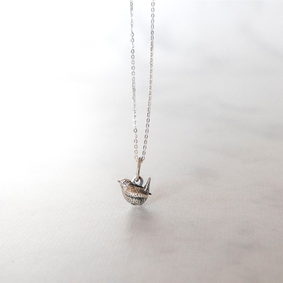 Delicate bird-inspired necklace supporting RSPB bird conservation.